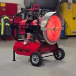 The SunFire SF160 diesel/kerosene radiant portable heater being used inside a shop.